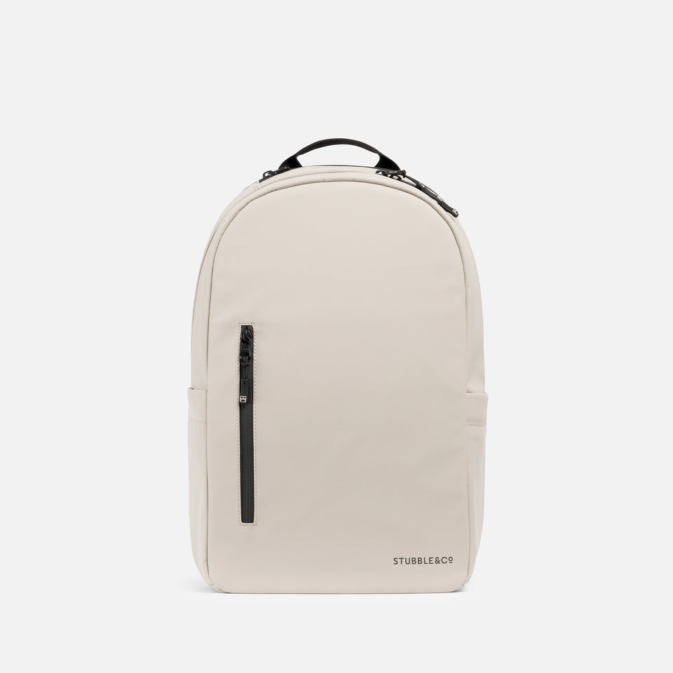 A studio shot of the front of the Everyday Backpack 15L in Sand 