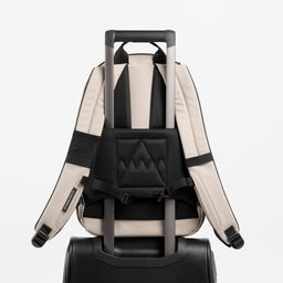 A studio shot of the trolley sleeve on the Everyday Backpack 15L in Sand