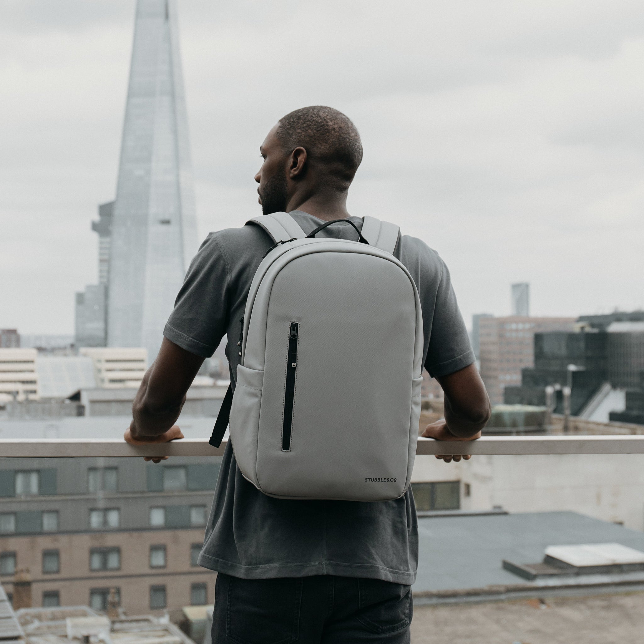 Man wearing Everyday Backpack in Concrete