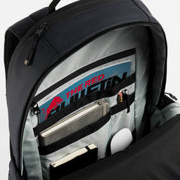 A studio shot of the interior organisation inside an Everyday Backpack in Midnight Blue