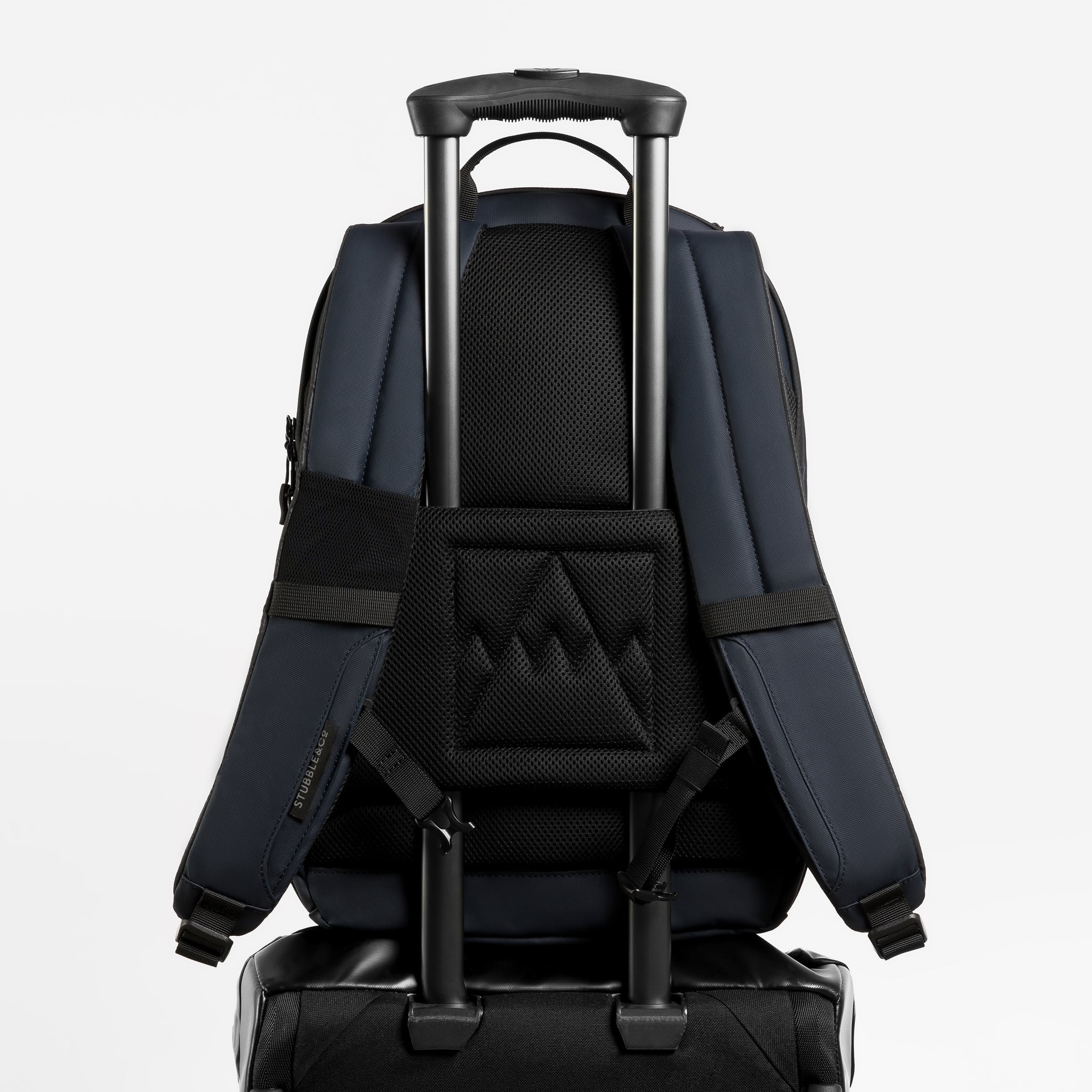 a studio shot of the trolley sleeve on an Everyday Backpack in Midnight Blue