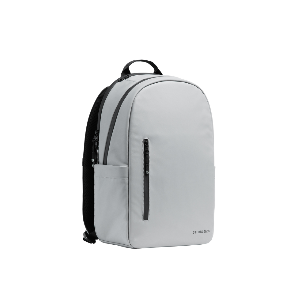 A studio shot of the front and side of a everyday backpack 20l as cut out transparent PNG- grey