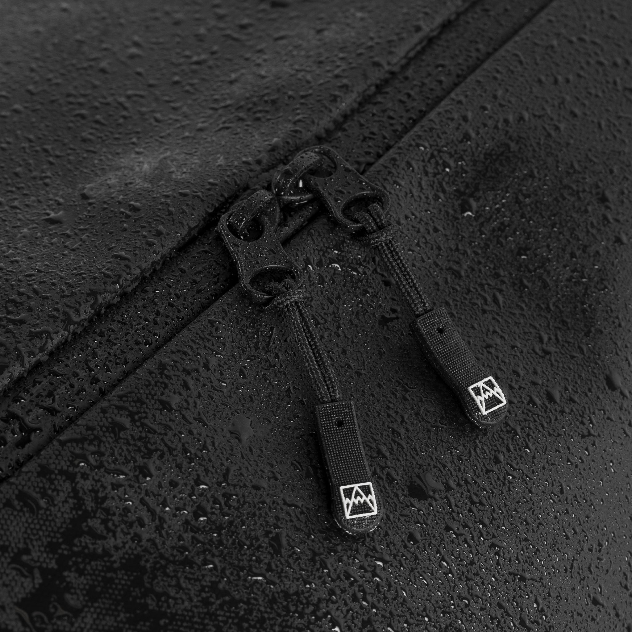 A studio shot of the waterproof materials and reliable zips on the Gym Duffel 25L in All Black
