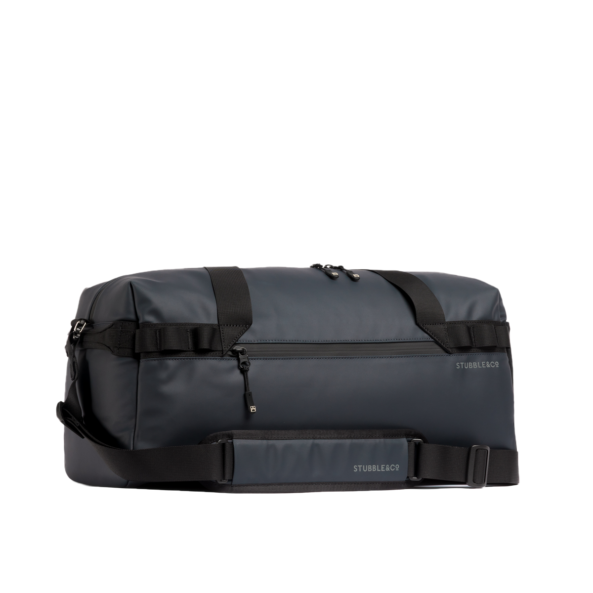 The Gym Duffel 25L in Midnight Blue with its shoulder strap
