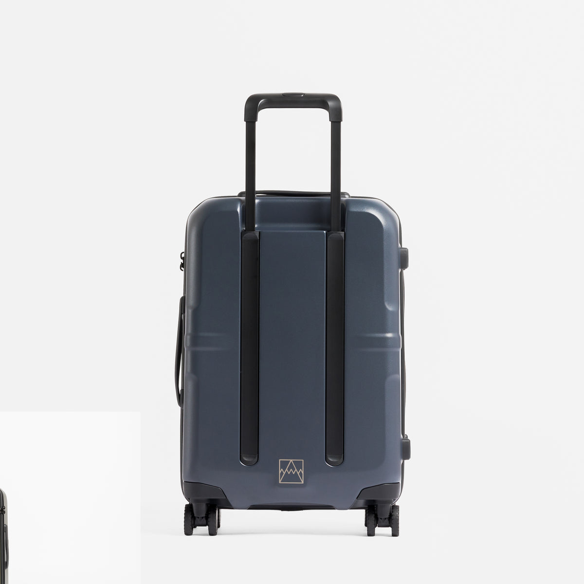 A studio shot of the back of the Hardshell 40L in Midnight Blue