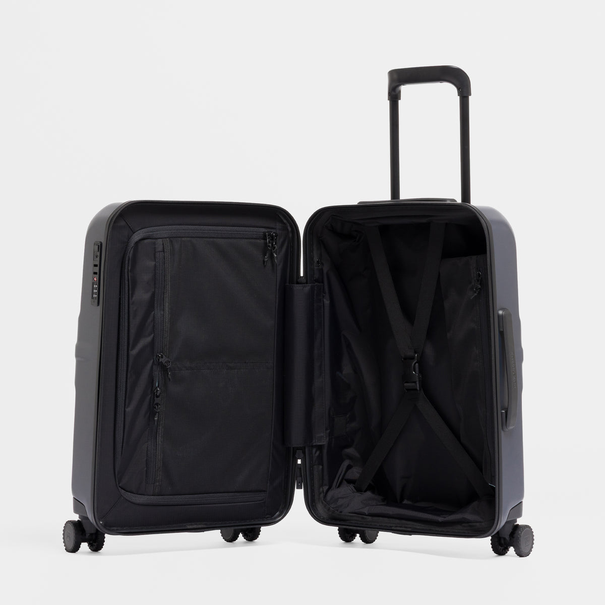 A studio shot of the Hardshell 40L in Midnight Blue standing up and open
