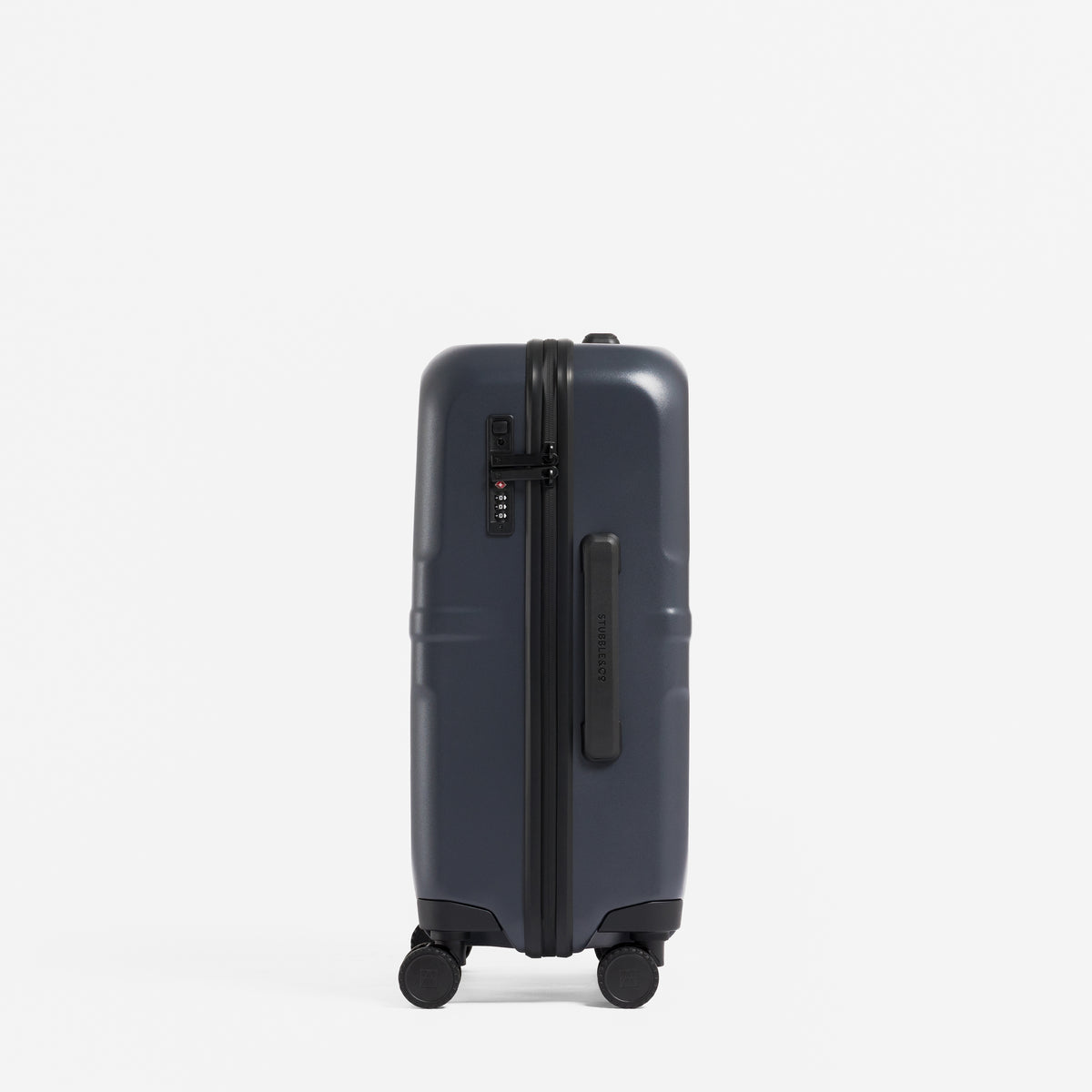 A studio shot of the side grab handle and lock on the Hardshell 40L in Midnight Blue
