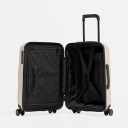 A studio shot of the Hardshell 40L in Sand standing up and open