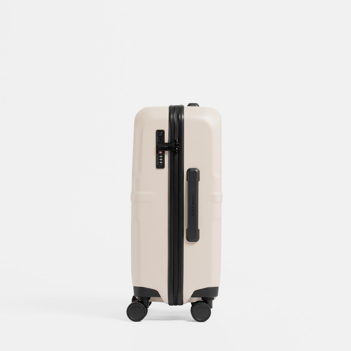 A studio shot of the side grab handle and lock on the Hardshell 40L in Sand