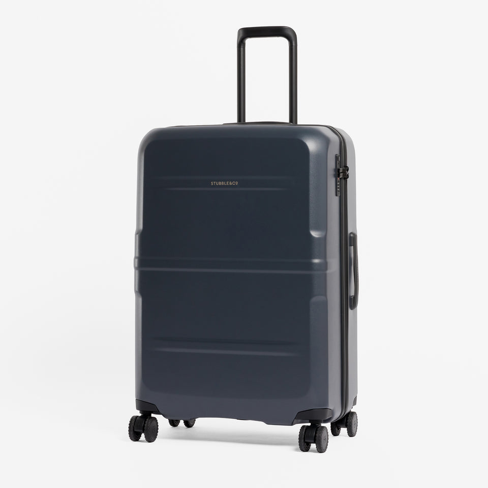 A studio shot of the front of the Hardshell 95L in Midnight Blue