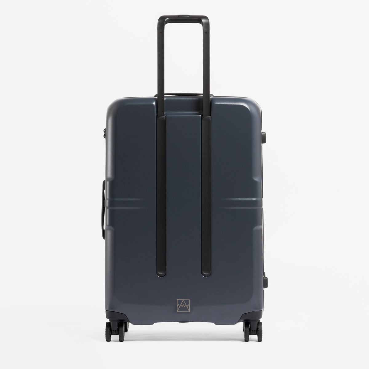 A studio shot of the back of the Hardshell 95L in Midnight Blue