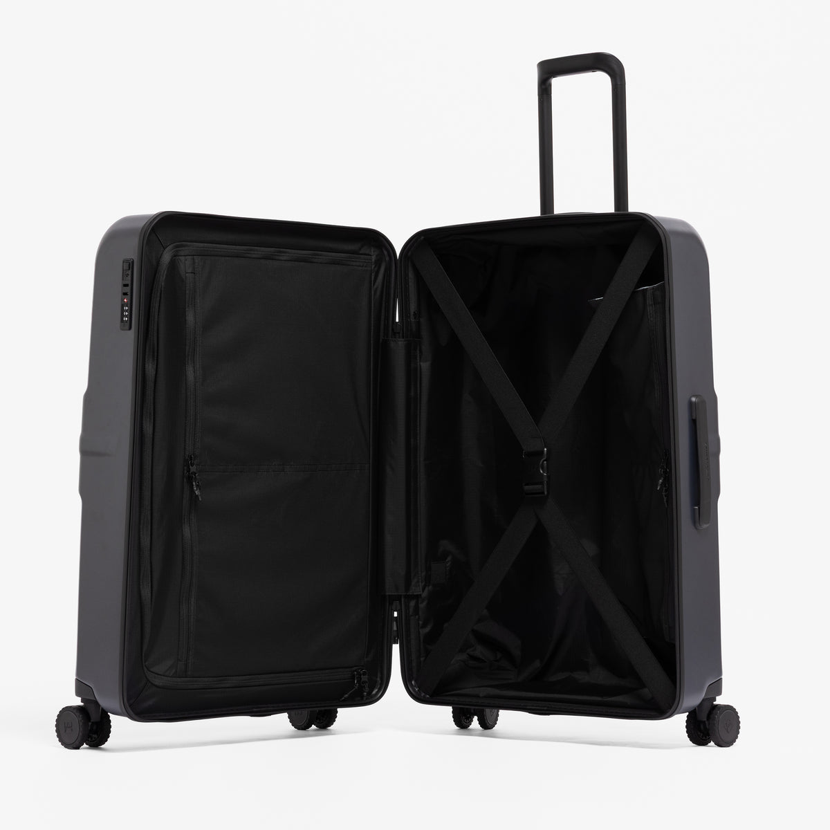 A studio shot of the Hardshell 95L in Midnight Blue standing and open