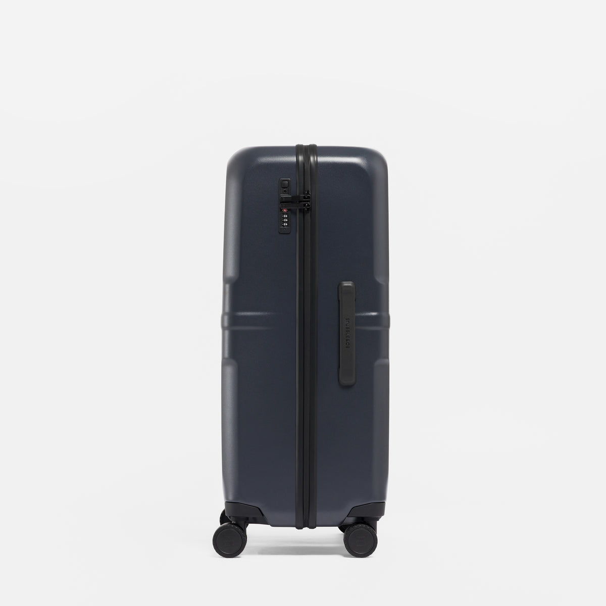 A studio shot of the side grab handle and lock on the Hardshell 95L in Midnight Blue
