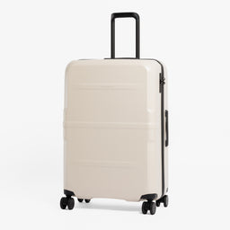 A studio shot of the front of the Hardshell 95L in Sand