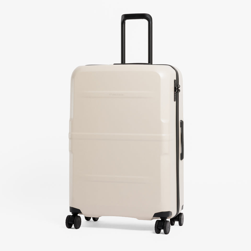 A studio shot of the front of the Hardshell 95L in Sand