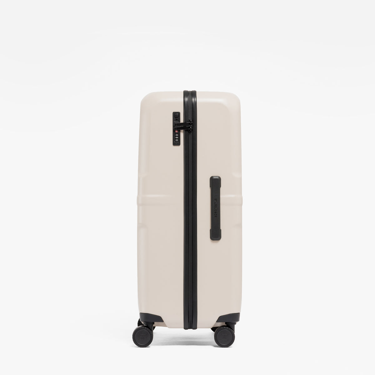 A studio shot of the side grab handle and side of the Hardshell 95L in Sand