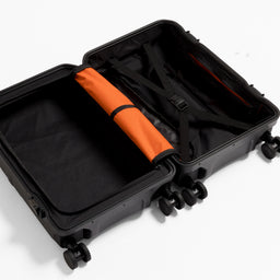 A studio shot of the inside and compression straps onthe Hardshell Pro 40L in All Black