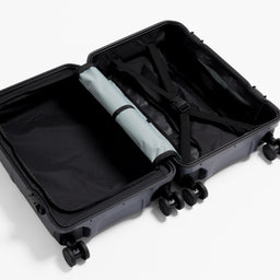 A studio shot of the inside and compression straps on the Hardshell Pro 40L in Midnight Blue