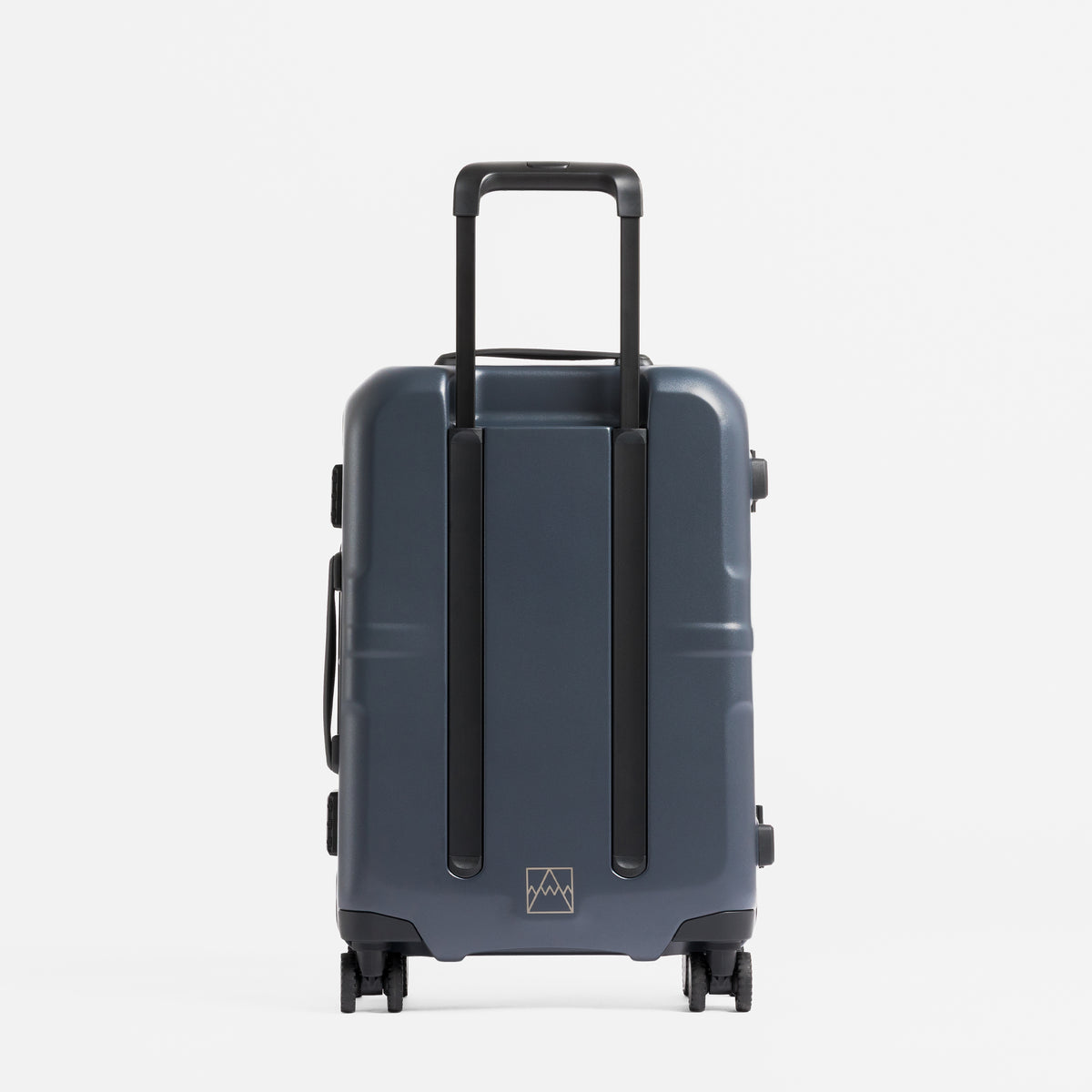 A studio shot of the back of the Hardshell Pro 40L in Midnight Blue