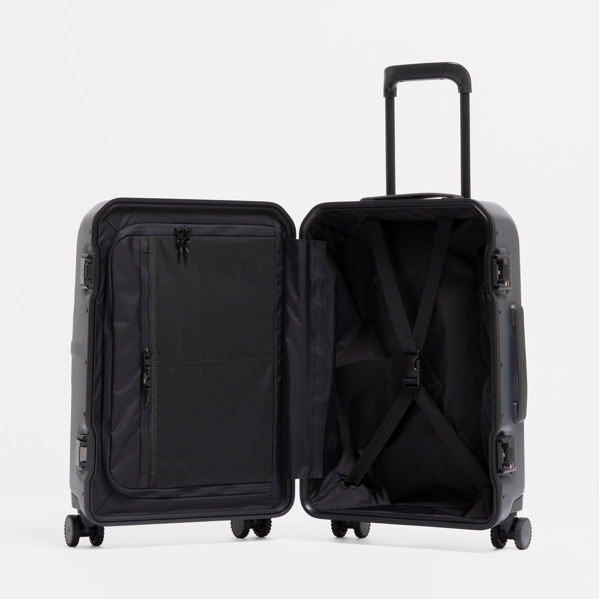 A studio shot of the Hardshell Pro 40L in Midnight Blue standing and open