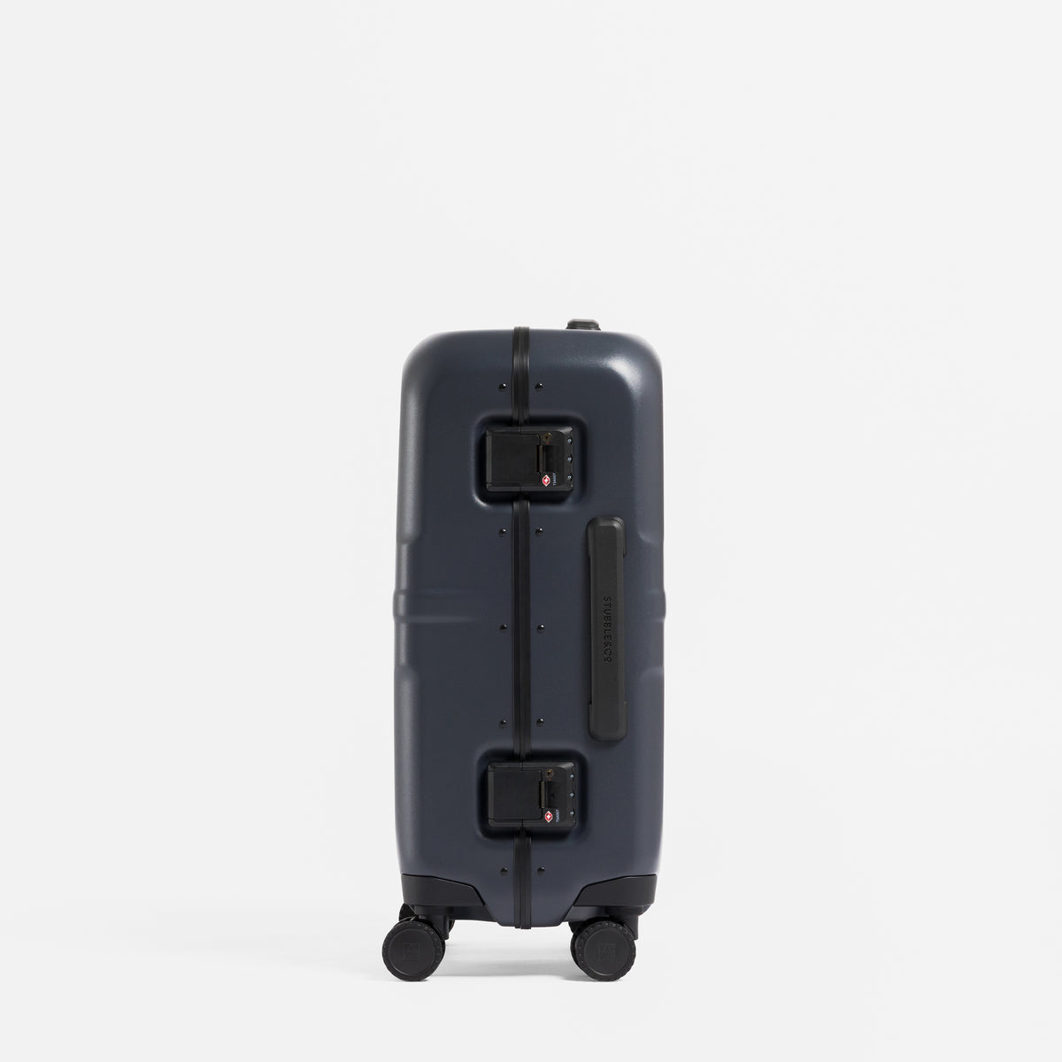 A studio shot of the side and grab handle of the Hardshell Pro 40L in Midnight Blue