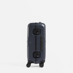 A studio shot of the side and grab handle of the Hardshell Pro 40L in Midnight Blue