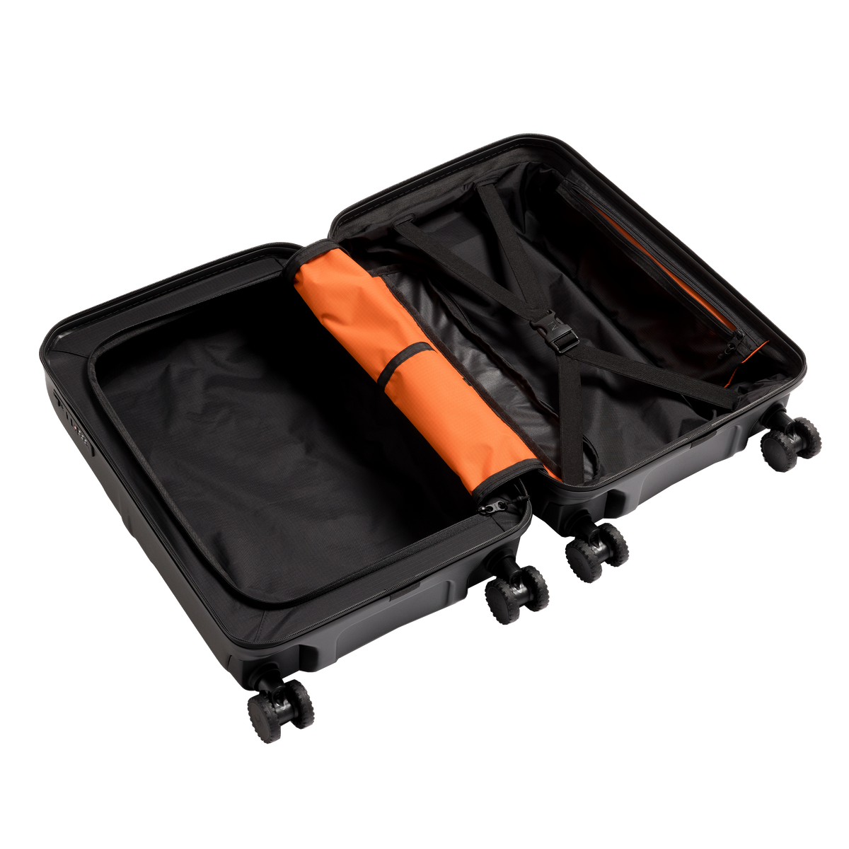 An open black hard-shell suitcase with four wheels, showing a black interior an orange rolled divider, isolated on a white background.