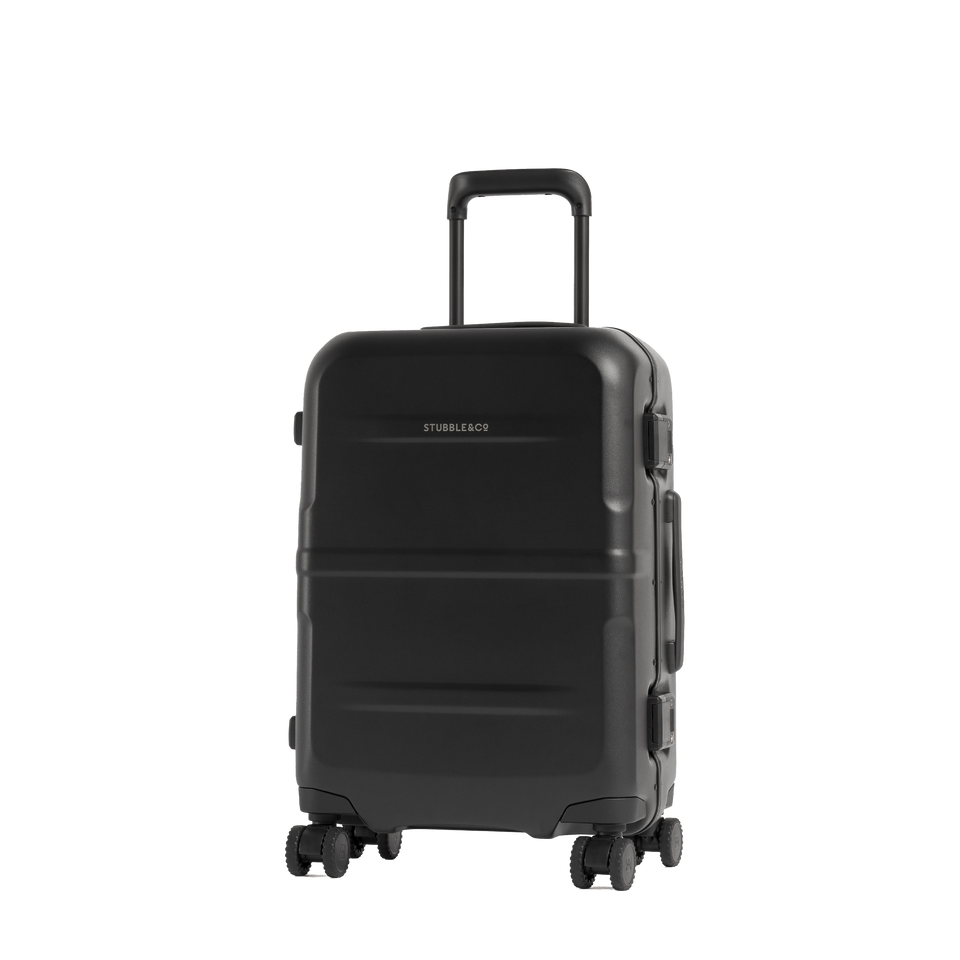 A black hard-shell spinner suitcase with an extended black telescoping handle, shown on a plain white background.