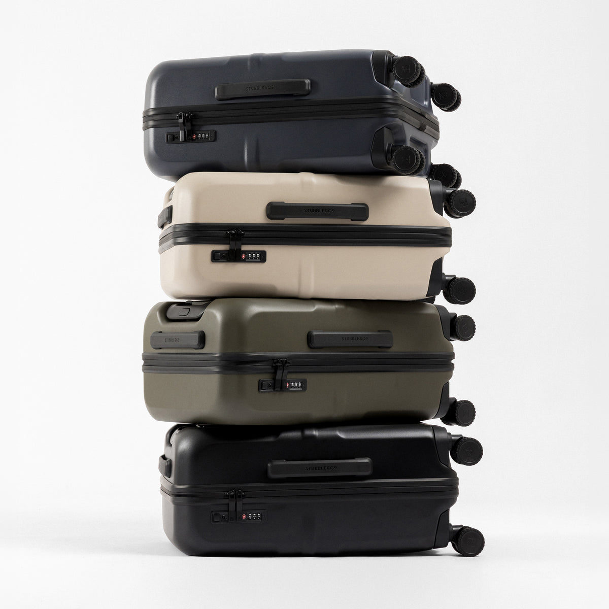 A studio creative shot of all of the Hardshell 40L stacked on top of each other in each colour including All Black