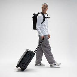 A man with the Hardshell Pro 40L in All Black