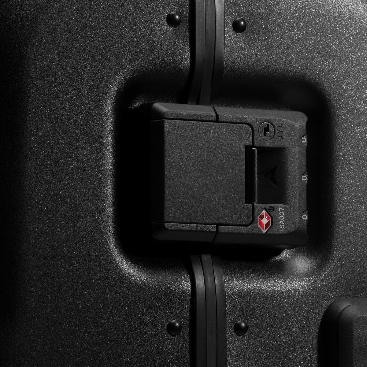 A studio shot of the clip and tsa lock on the Hardshell Pro 95L in All Black