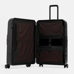 A studio shot of the Hardshell Pro 95L in All Black standing and open