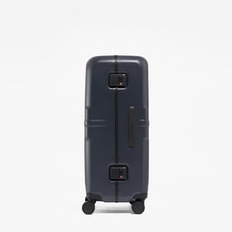 A studio shot of the side and grab handle on the Hardshell Pro 95L in Midnight Blue