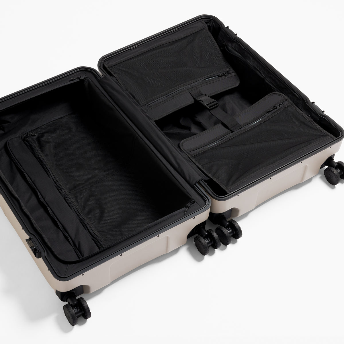 A studio shot of the inside and compression straps in the Hardshell Pro 95L in Sand
