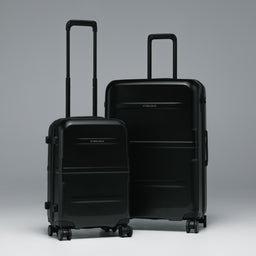 A studio shot of the Hardshell range with 40L and the Hardshell 95L in All Black