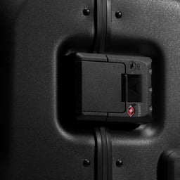 A studio shot of the clip and tsa lock on the Hardshell Pro Trunk 100L in All Black