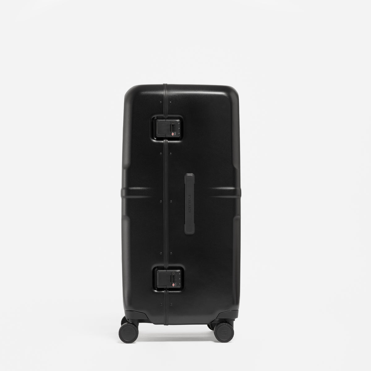 A studio shot of the side and grab handle on the Hardshell Pro Trunk 100L in All Black