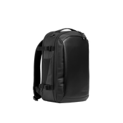 A studio shot of the front and side of an hybrid backpack 20l as cut out transparent PNG- black