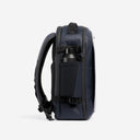A studio shot of the side bottle pocket on a Hybrid Backpack 20L in Midnight Blue