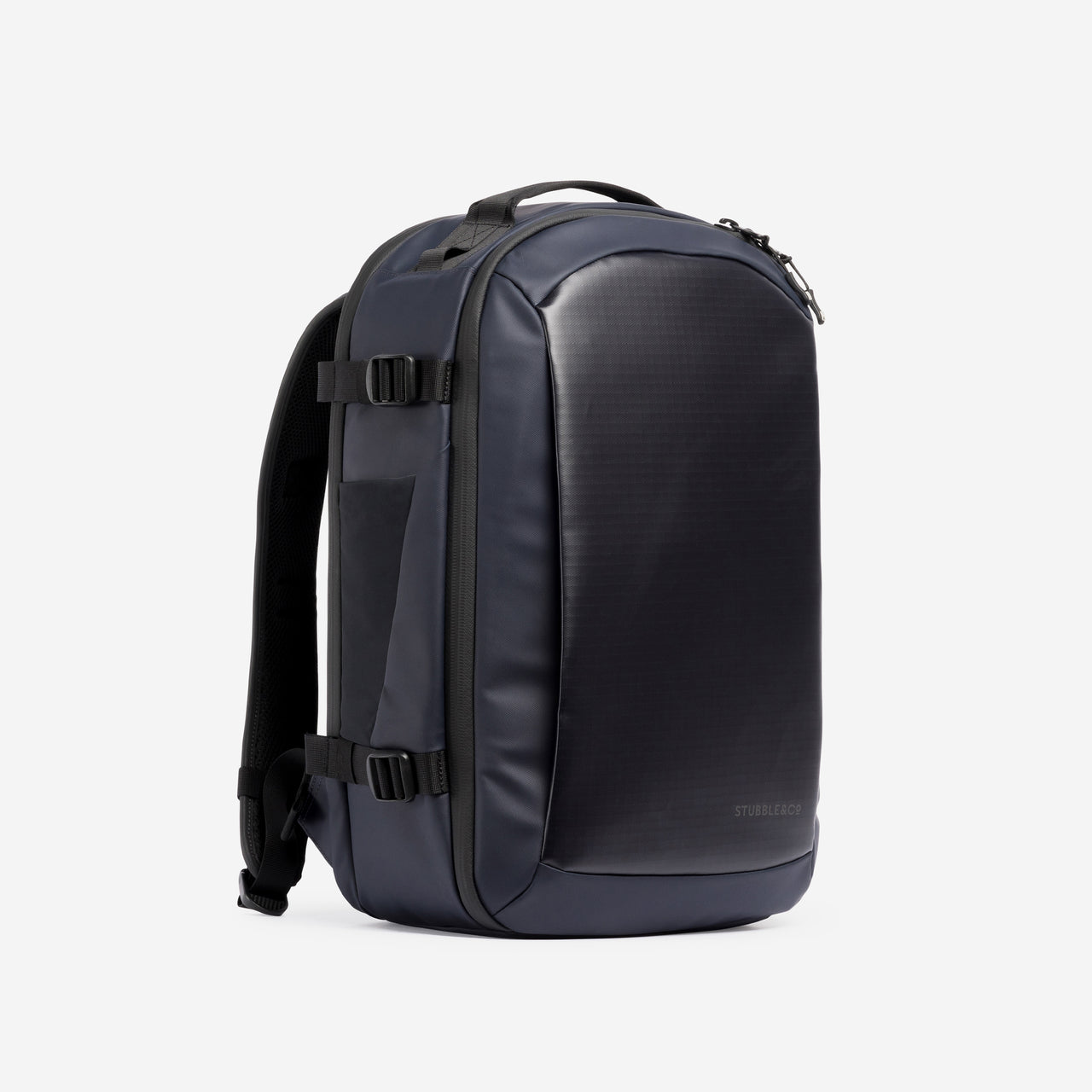 A studio shot of the front and side of a Hybrid Backpack 20L in Midnight Blue