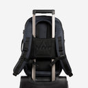 A studio shot of the trolley sleeve on a Hybrid Backpack 20L in Midnight Blue