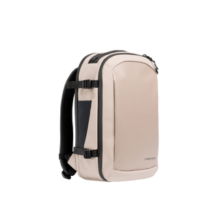 A studio shot of the front and side of an hybrid backpack 20l as cut out transparent PNG- sand
