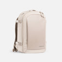 A studio shot of the front and side of the Tonal Sand Hybrid Backpack 20L