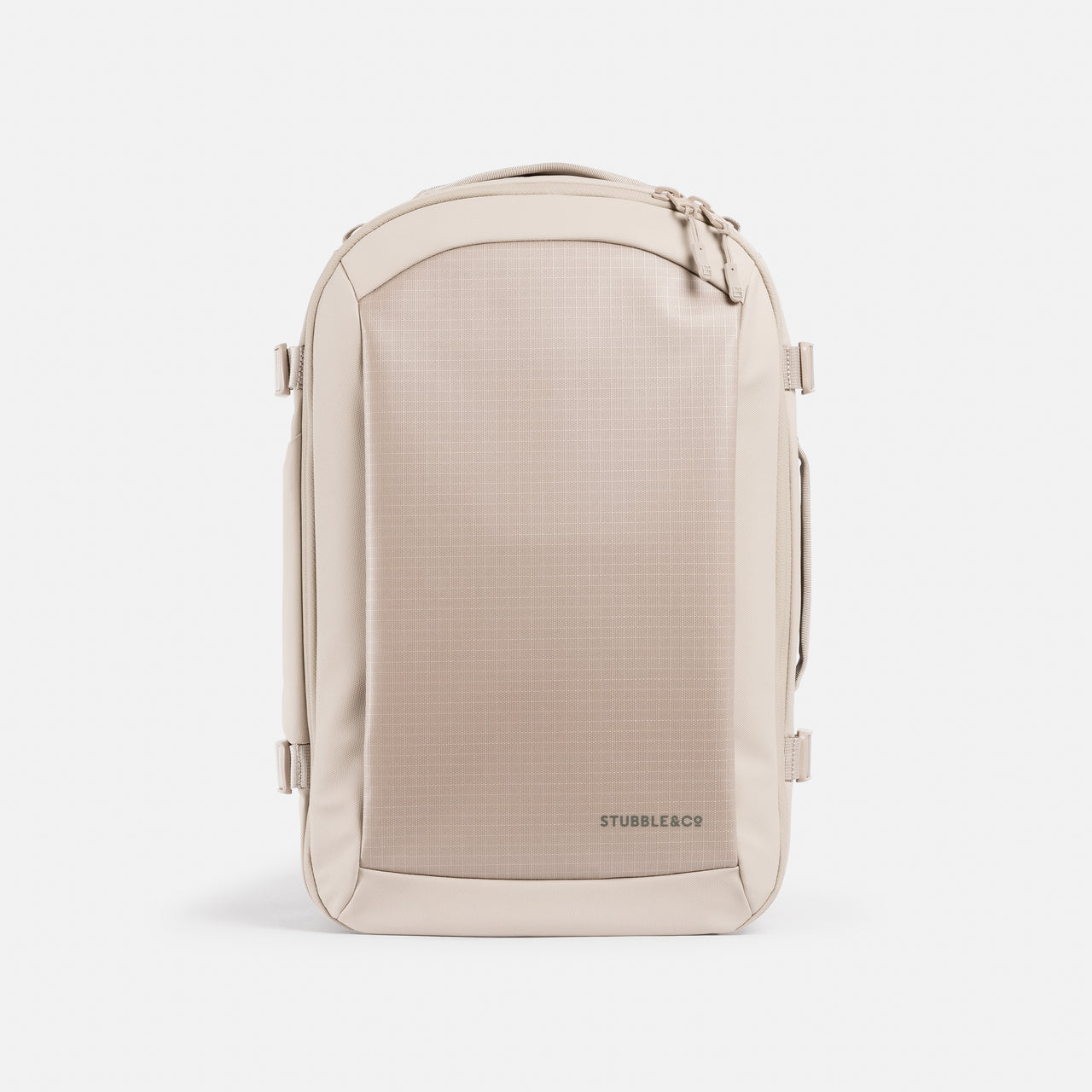 A studio shot of the elasticated bottle pocket on the side of the Hybrid Backpack 20L in Tonal Sand