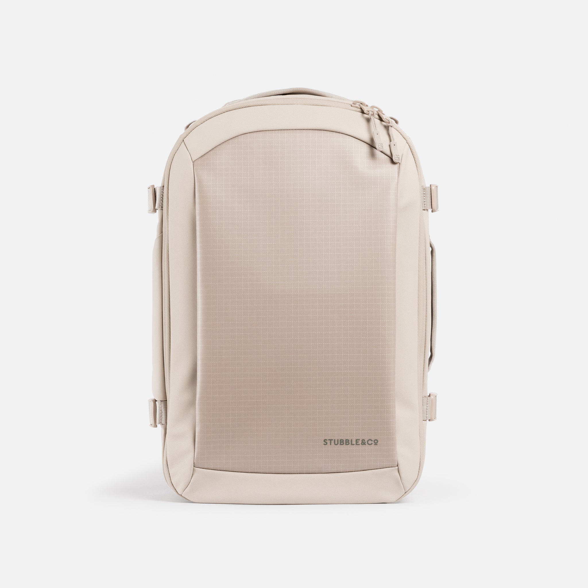 A studio shot of the elasticated bottle pocket on the side of the Hybrid Backpack 20L in Tonal Sand