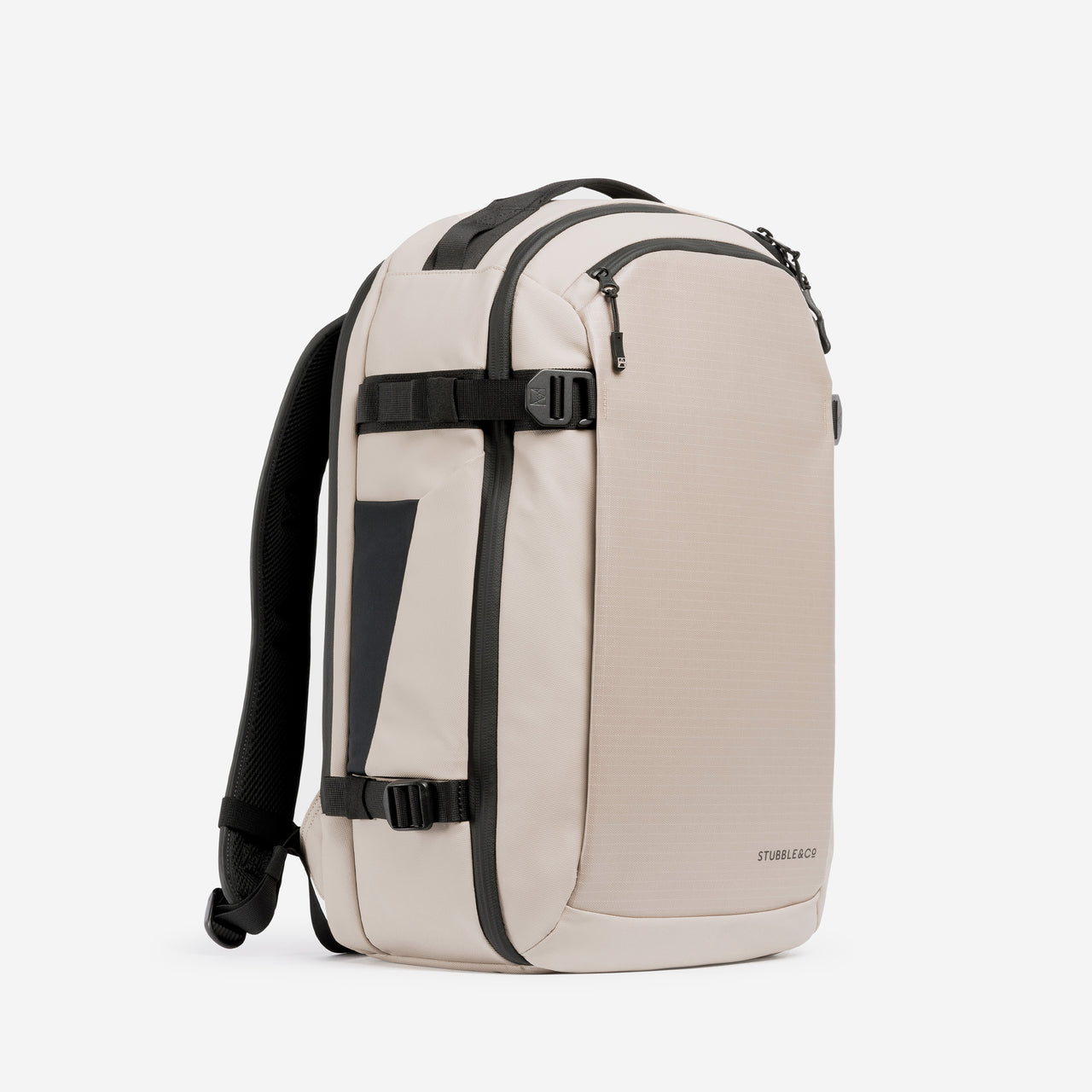 A studio shot of the front and side of the Hybrid Backpack 30L in Sand