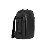 A studio shot of the front and side of a hybrid backpack 30l as cut out transparent PNG-  black