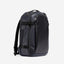 A studio shot of the side and front of the Hybrid Backpack 30L in Midnight Blue