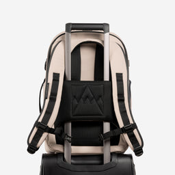 A studio shot of the trolley sleeve on the Hybrid Backpack 30L in Sand