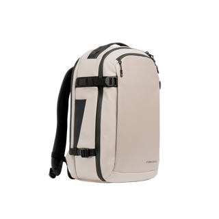 A studio shot of the front and side of a hybrid backpack 30l as cut out transparent PNG-  sand